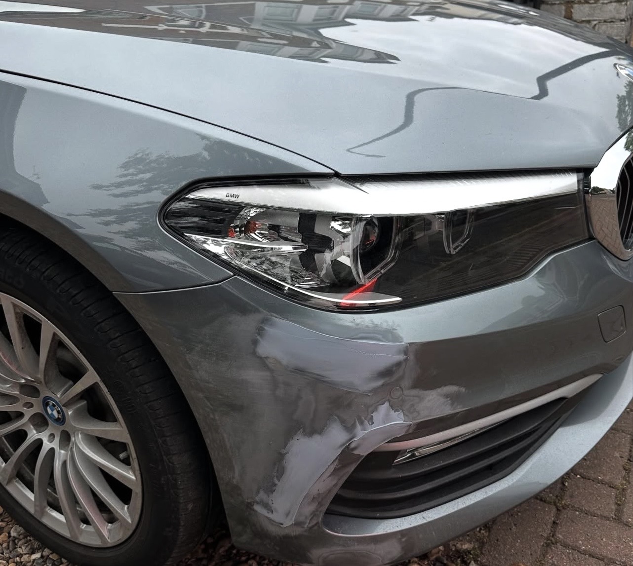 BMW 5 Series front wing filled and prepped before paint