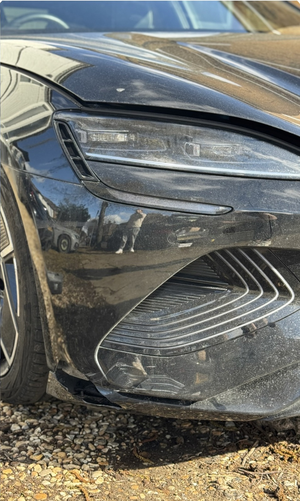 Gloss black front end damage before repair